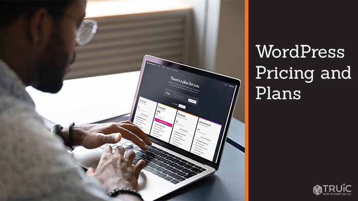 Man looking at WordPress plans and pricing on laptop.