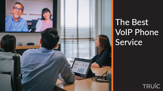 Business people using a VoIP service to video conference.