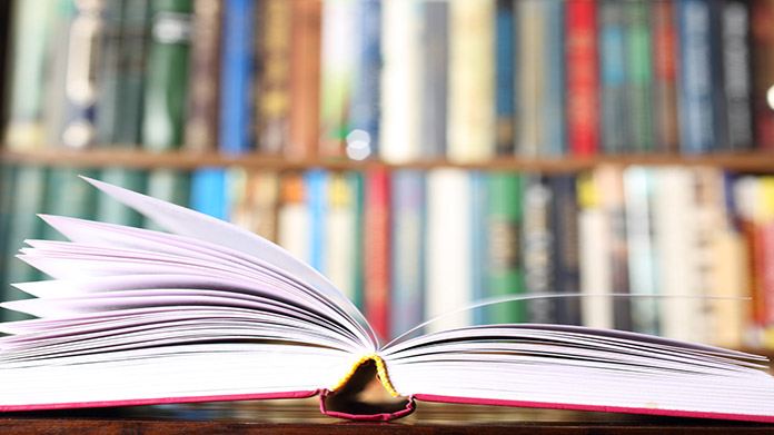 an open book on a table of a bookstore