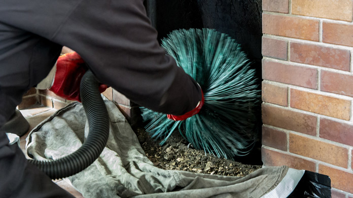 A chimney being cleaned