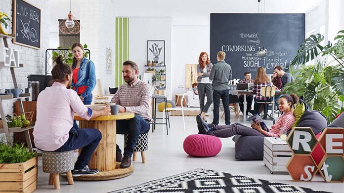 groups of people working in a coworker space