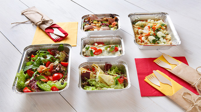 To-go meals in containers on a tabletop