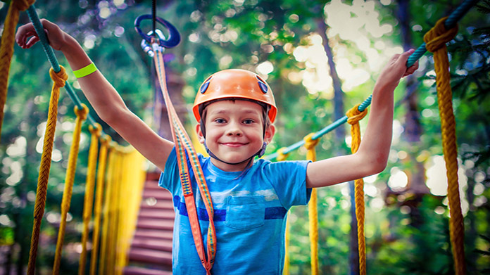 A child on a rope bridge