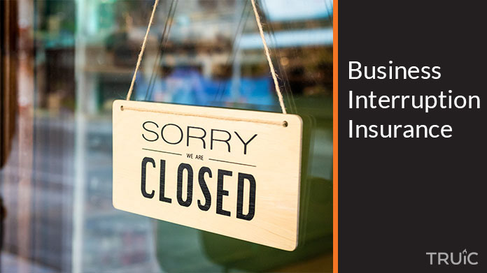 A closed sign outside of a business.