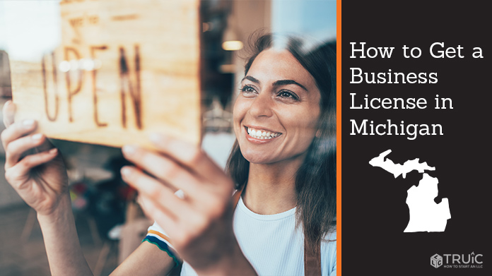 Woman holding open sign after getting her business license