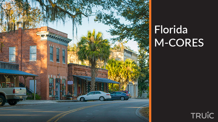 Quaint rural downtown in Florida with text that reads Florida M-CORES