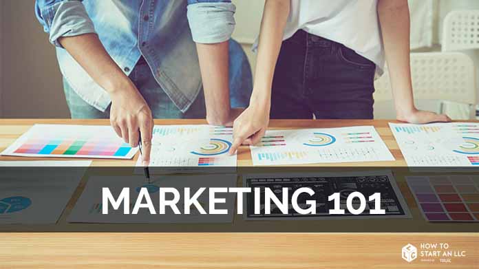 Two people studying small business marketing.