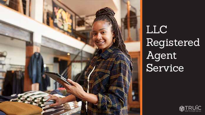 A businesswoman looking up an LLC Registered Agent Service