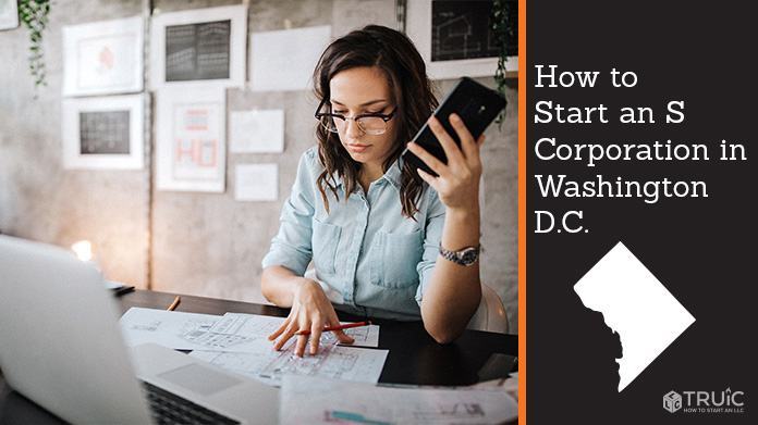 Woman looking over paperwork to start an S corporation in Washington DC